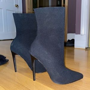 STEVE MADDEN CENTURY BLACK HEELED SOCK BOOT